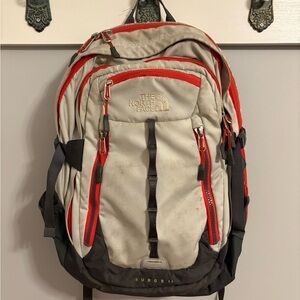 The North Face Gray and Red Backpack for Everyday Adventures